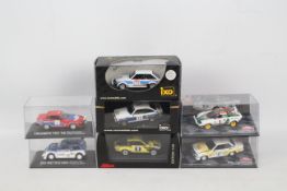 IXO - DeAgostini - Schuco - A group of seven boxed 1:43 scale diecast rally cars.