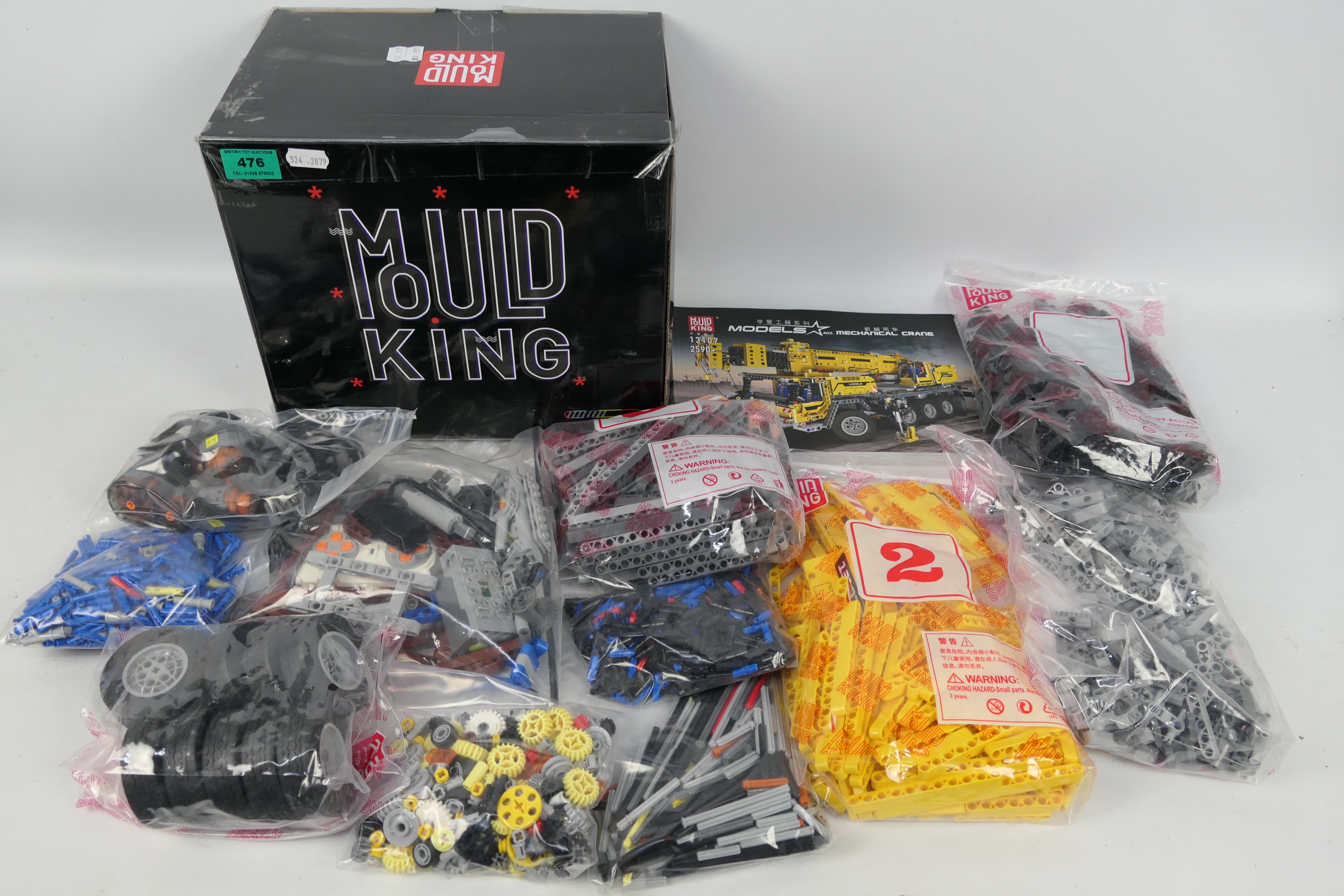 Mould King - A mould king model construction set, mechanical crane # 13107 has 2590+ pieces.