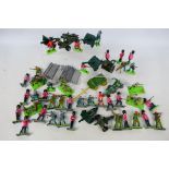 Britains Detail - A large collection of loose soldiers including British and German and field guns.
