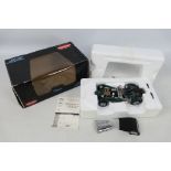 Kyosho - A 1:18 scale Kyosho Caterham Super Seven die-cast model in green livery - The #7020 model
