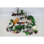 Britains - A large loose collection of Britains plastic farm animals, workers, and accessories.