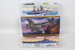 Tamiya - Three boxed plastic model kits in various scales from Tamiya.