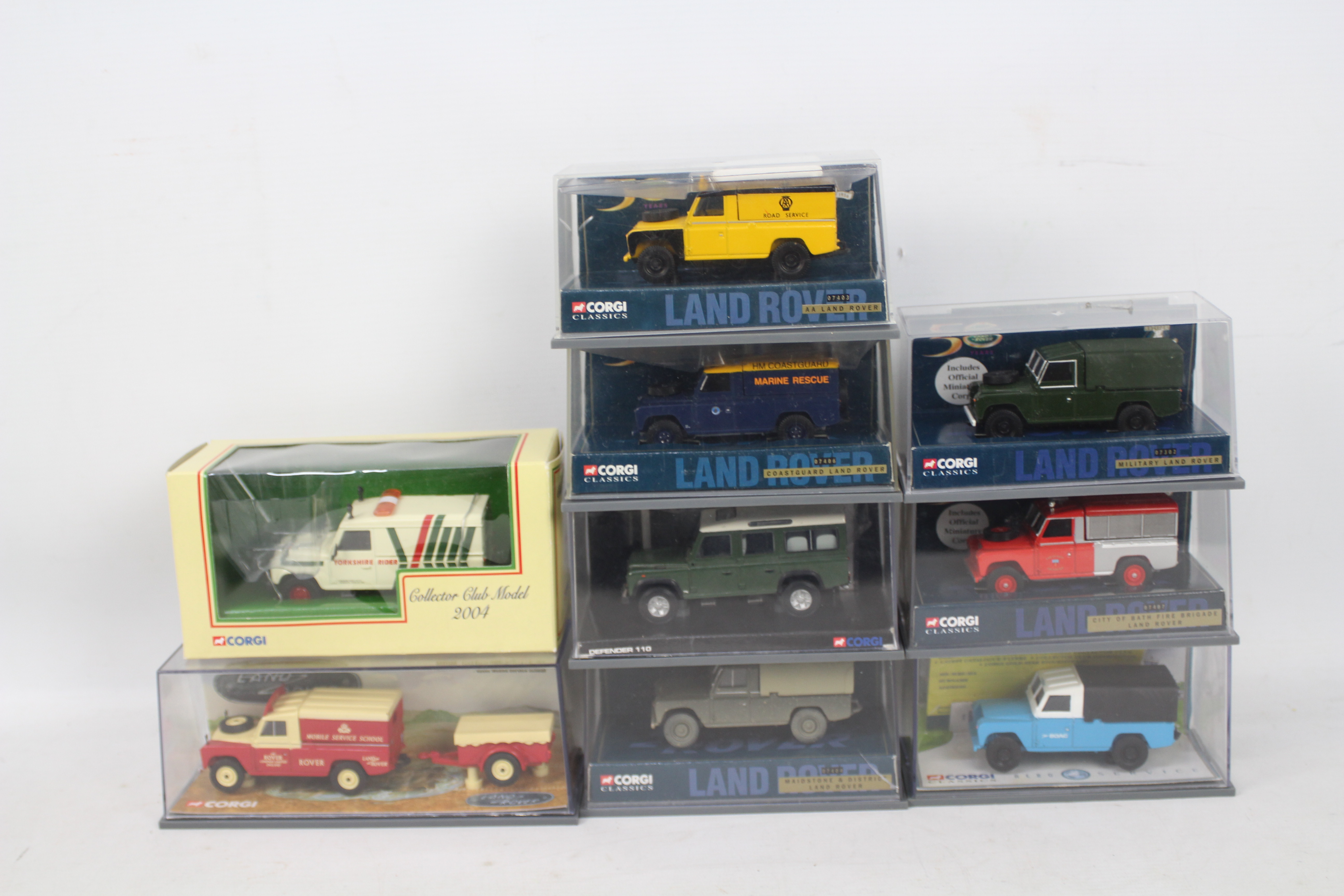 Corgi Classics - A troop of nine boxed diecast model Land Rovers from various Corgi ranges.