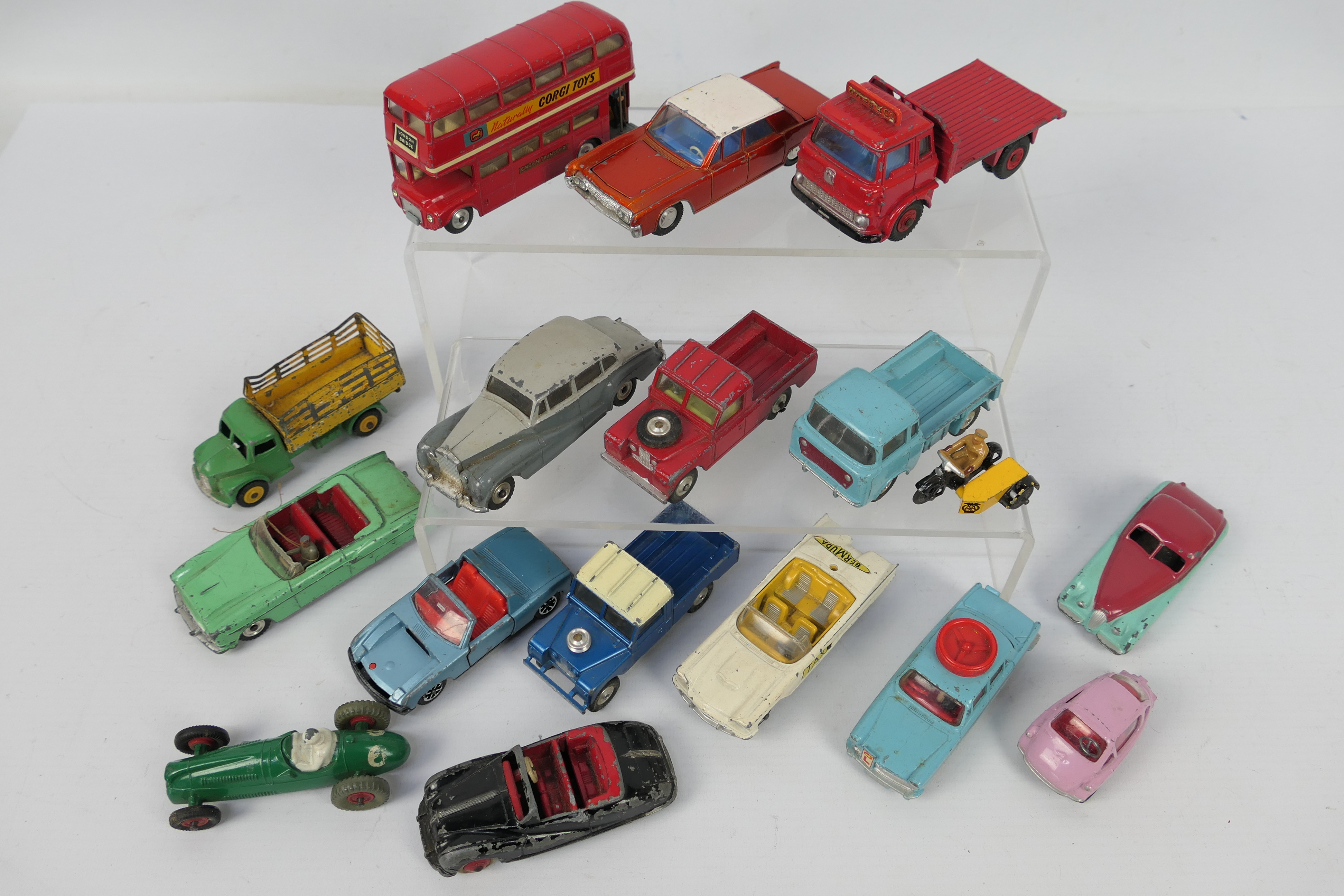 Dinky Toys - Corgi Toys - A loose collection of playworn Dinky and Corgi Toys.