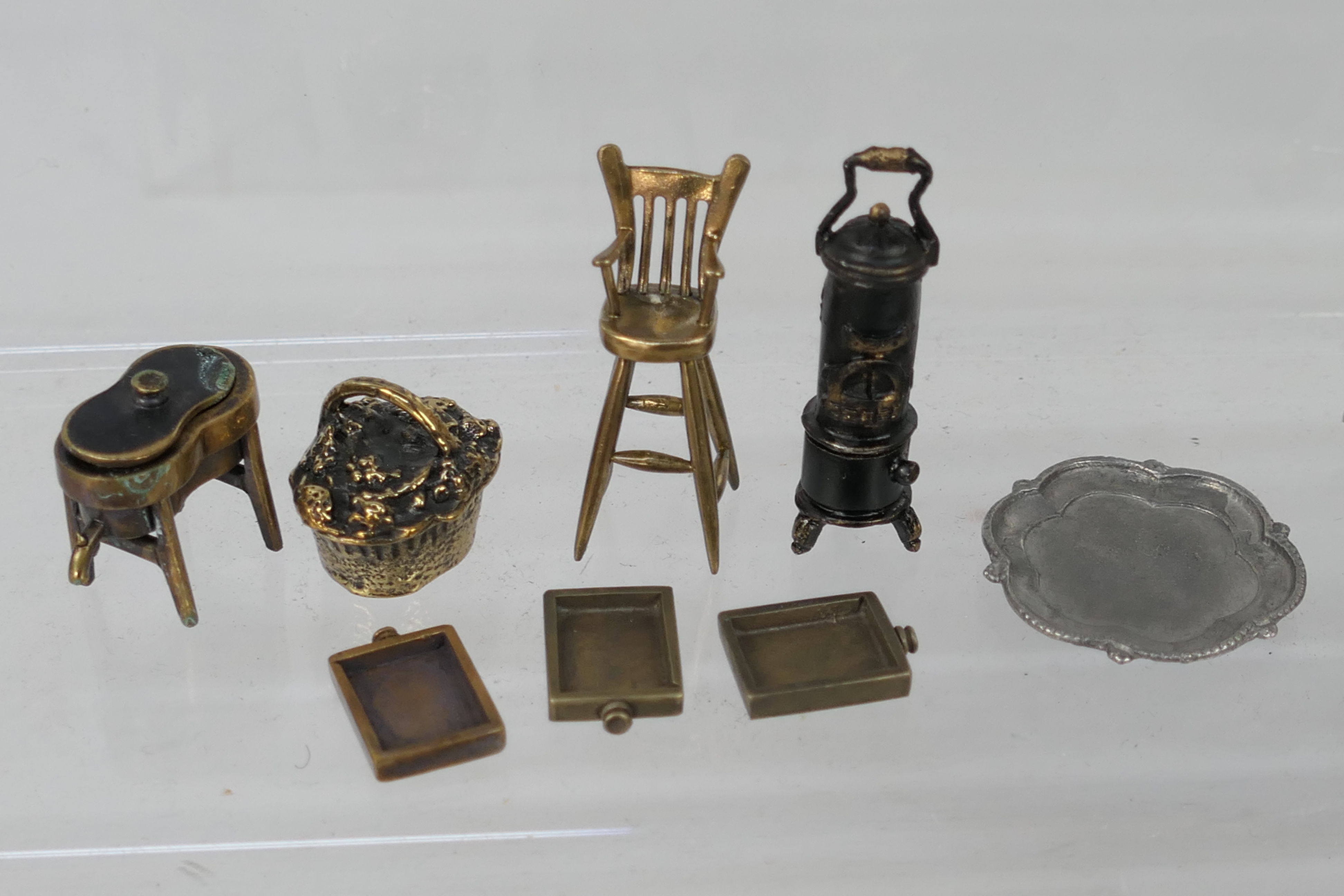 Unknown maker - An unboxed group of unmarked predominately bronze dolls house furniture. - Image 4 of 9