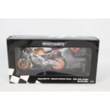 Minichamps - A boxed Minichamps #122061069 Honda RC211V Repsol Honda Team 'Nicky Hayden' MotoGP