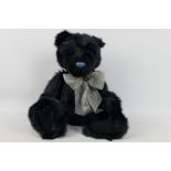 Charlie Bears - A dark-blue coloured Charlie Bear.