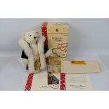 Steiff musical Christmas Teddy Bear - A boxed and bagged limited edition Steiff musical Christmas