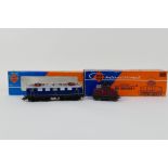 Roco - Two boxed HO gauge continental locomotives.