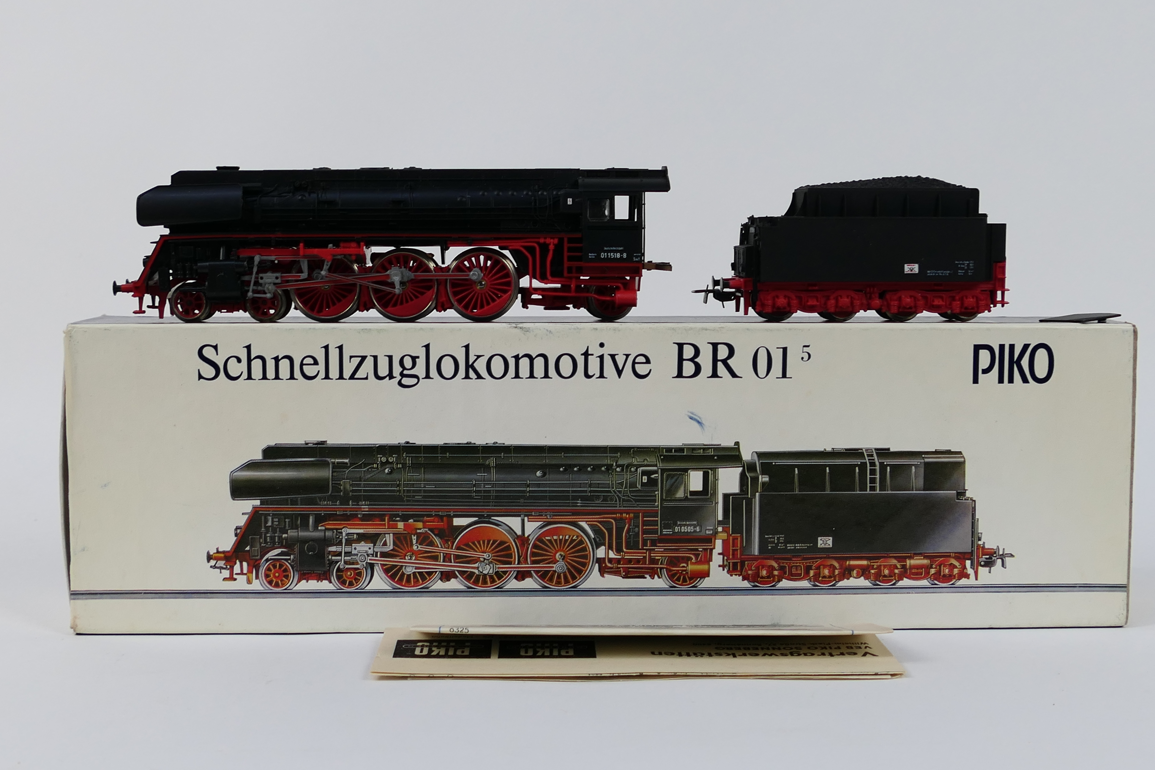 Piko - A boxed Piko #5/6325 BR01 4-6-2 HO gauge steam locomotive and tender.