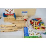 Melissa & Doug - A wooden work bench with tools and a n instruction book by Melissa & Doug Toys.