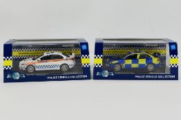 Model Icons - Two boxed 1:43 scale Limited Edition diecast Mitsubishi Lancer police cars from Model