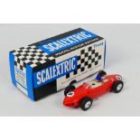 Scalextric - A boxed Ferrari Sharknose slot car model in red # C62.