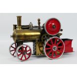 Unknown Maker - An all metal working model of a vintage steam tractor measuring 23 x 14 x 10 cm and