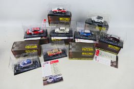 Atlas Editions - A starting grid of eight boxed 1:43 scale diecast model cars from the Atlas