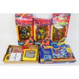 Marvel - Tyco - Toy Biz - Three boxed Marvel X-Men 10" action figures and a boxed X-Men playset.
