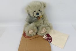 Charlie Bears - "Olga" CB124934, 2012. Dove grey plush, with blue stitched nose.