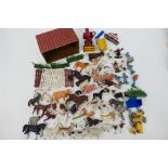 Britains - Corgi - Matchbox - A collection of farm models including 9 x figures, a wooden barn,