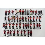 Britains - A collection of figures including 8 x un detailed Guards, 6 x Guards in firing position,