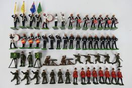 Britains - A collection including 4 x Riflemen bayoneting, 4 x Riflemen kneeling,