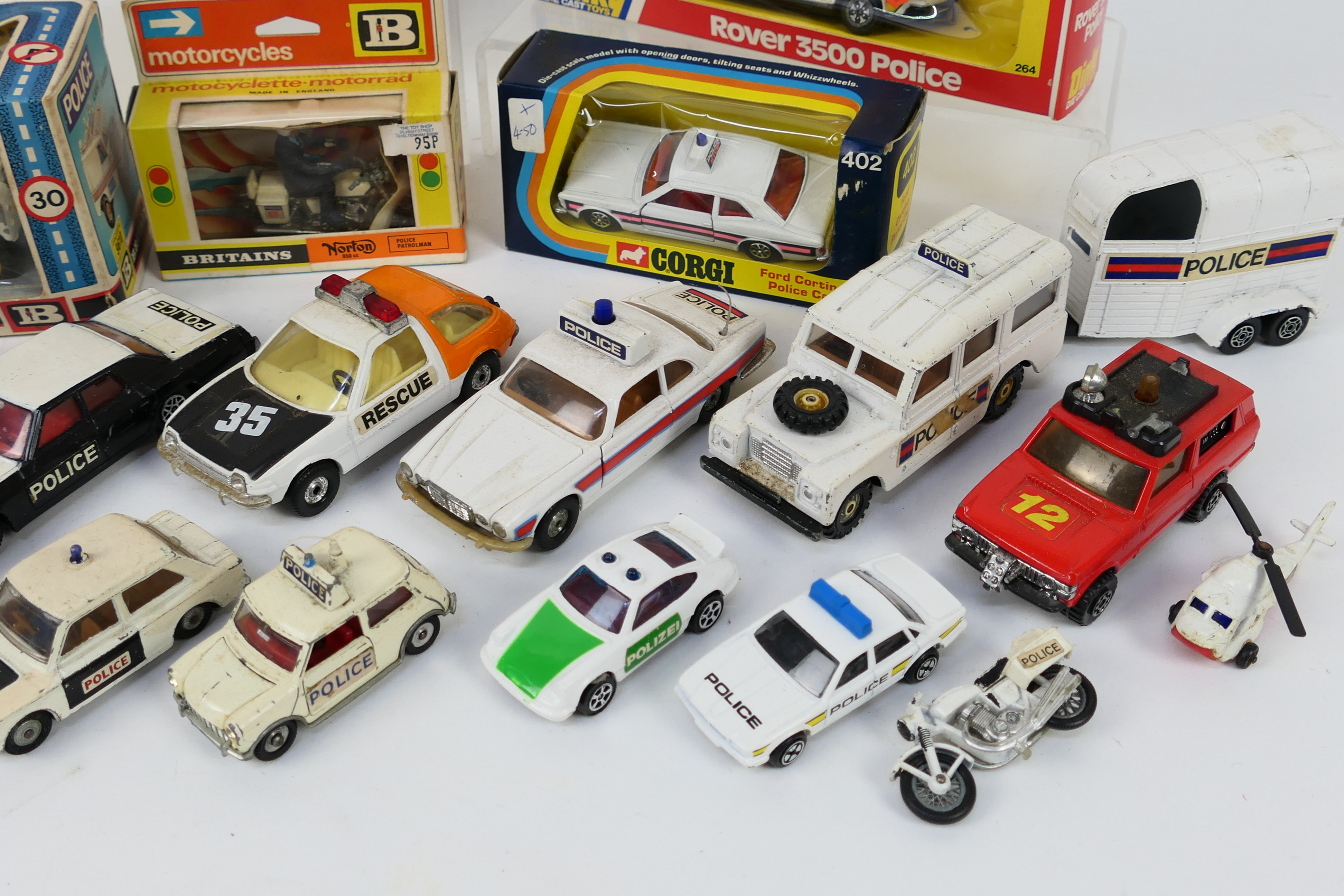 Corgi - Britains - Dinky - Matchbox - Others - Five boxed diecast Police vehicles with a group of - Image 5 of 5