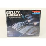 Monogram - A boxed #6026 'Cylon Raider' model kit from Battlestar Galactica - Box is factory sealed.