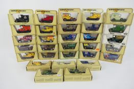 Matchbox Models of Yesteryear - A collection of 30 Matchbox Models of Yesteryear in straw boxes.