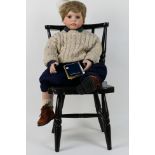 Celia Doll Company - An unboxed Limited Edition Celia Doll Company 'Oliver' bisque doll,