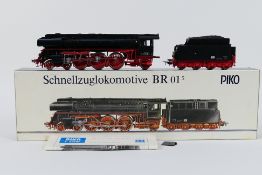 Piko - A boxed Piko #5/6325 BR01 4-6-2 HO gauge steam locomotive and tender.