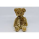 Unmarked Bear - A miniature 'Yes/No' teddy bear attributed to Schuco.