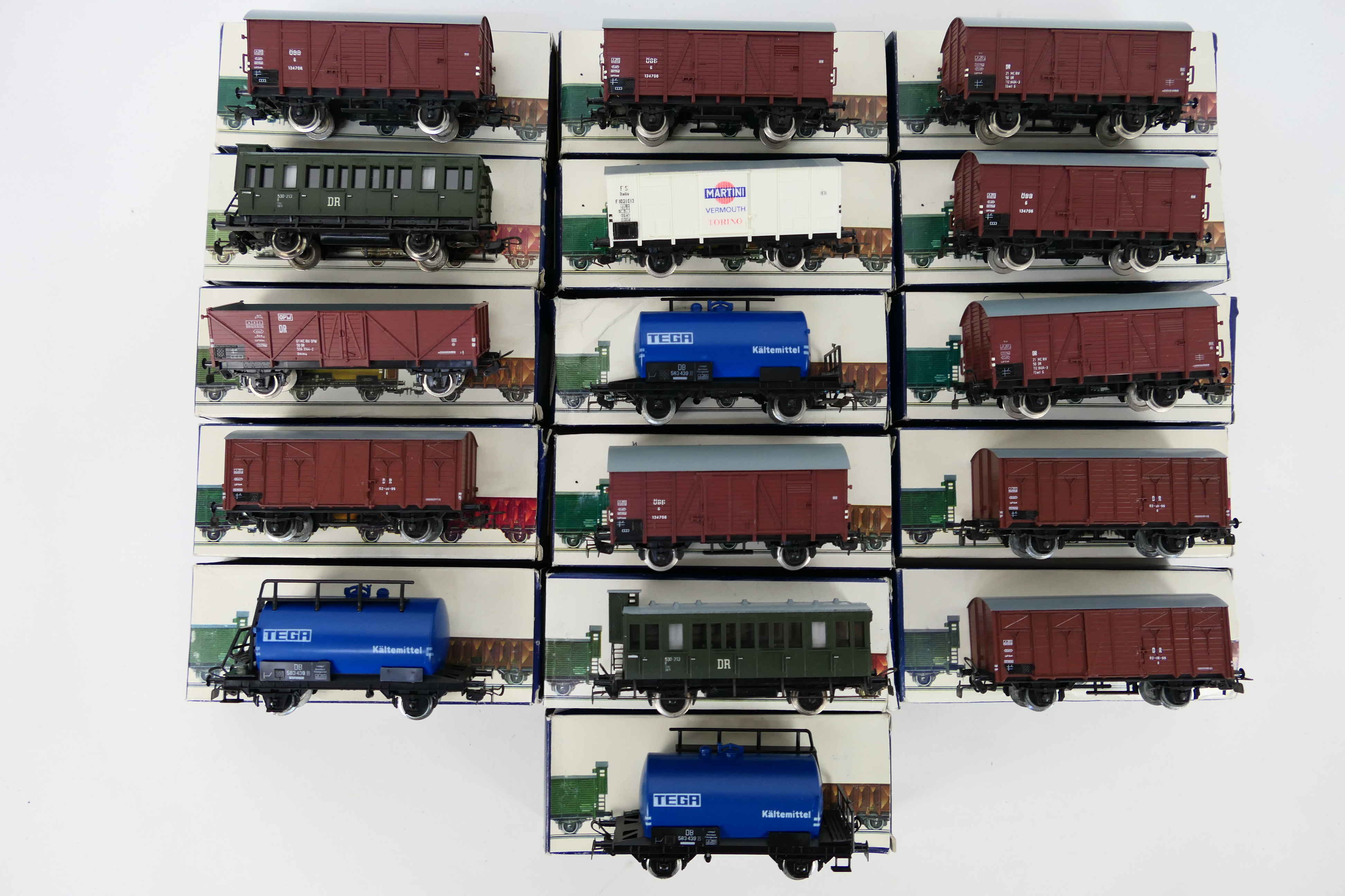 Piko - A boxed rake of 16 HO gauge predominately freight rolling stock wagons and tankers.