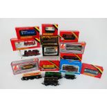 Hornby - Lima - Graham Farish - Airfix - A boxed OO gauge steam locomotive and 11 x boxed wagons