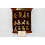 Danbury Mint - A collection of 12 Danbury Mint 'Teddy Bear Museum Showcase ' miniature bears with a