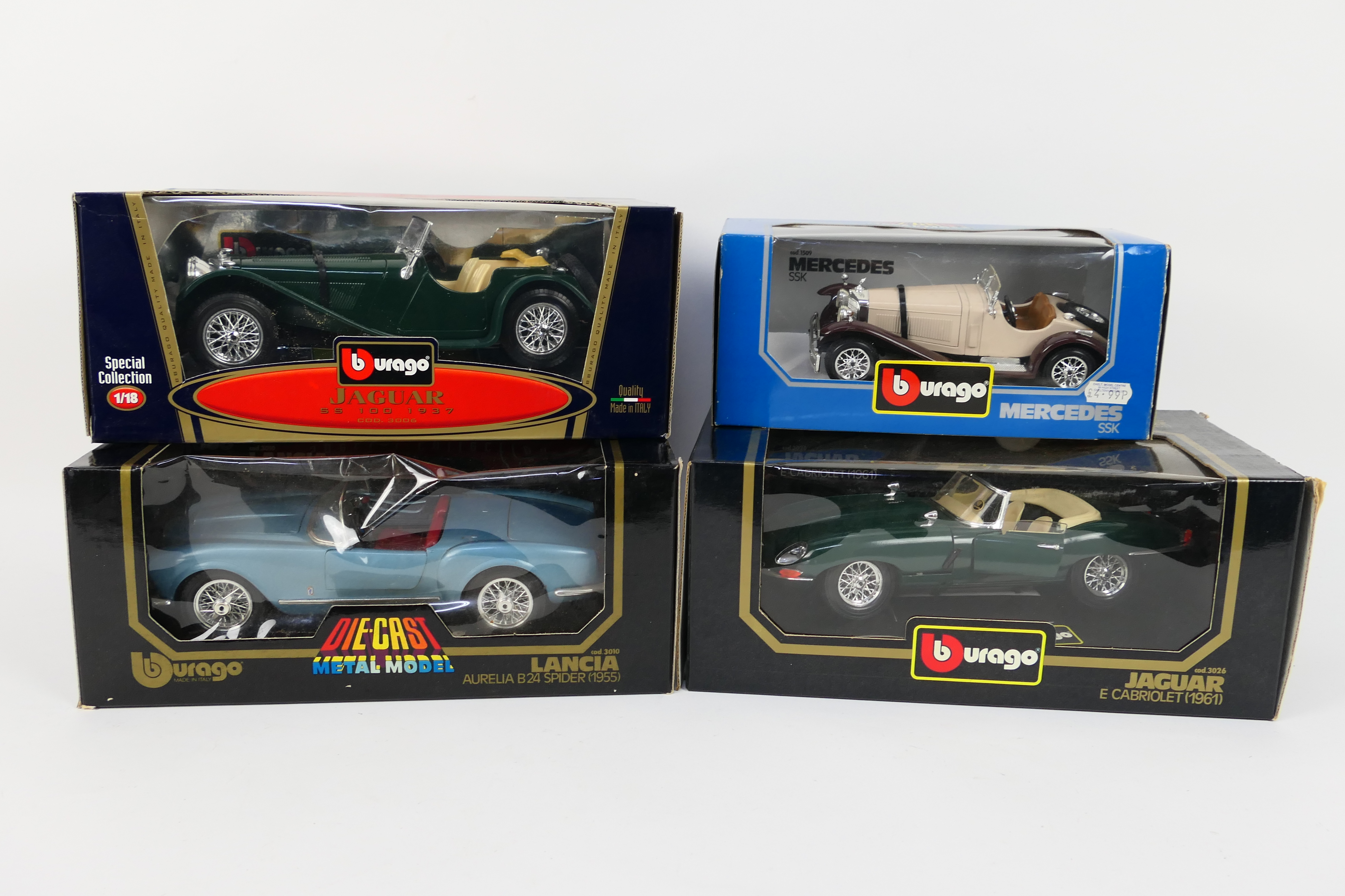 Bburago - Four boxed Bburago diecast model vehicles in 1:18 and 1:24 scales.