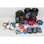 Pokemon - A collection of items including 13 empty tins, 26 x mini figures and more.