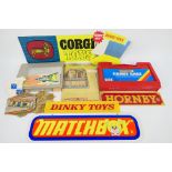 Matchbox - Dinky - A Matchbox 18 car Carry Case, a collection of Matchbox card roadway sections,