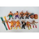 Hasbro - WWF - Titan sports. A selection of Thirteen loose WWF figures / watches / water squirters.