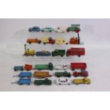 Dinky Toys - Corgi Toys - An unboxed group of playworn diecast model vehicles.