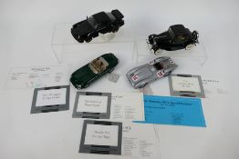 Franklin Mint - Four unboxed 1:24 scale diecast model cars from Franklin Mint.