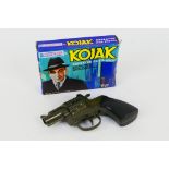 Lone Star - A boxed vintage diecast Lone Star #1180 'Kojak' repeater cap pistol.