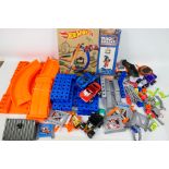 Hot Wheels - A collection of Hot Wheels Track Builder and Mega Sets parts with 4 x vehicles.