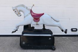 RGM - A vintage coin operated ride on amusement arcade horse.