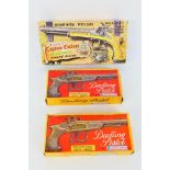 Lone Star - Three boxed vintage diecast toy cap guns.