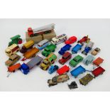 Dinky Toys - Corgi Toys - An unboxed group of playworn diecast model vehicles.