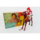 Quercetti - A boxed Gigante Galoppa clockwork galloping horse and rider with key.