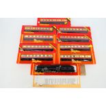 Hornby - A boxed OO Gauge locomotive and 9 x boxed coaches,