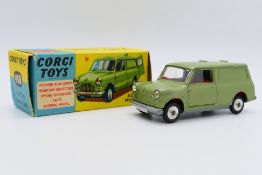 Corgi - A boxed Austin Mini Van in metallic green # 450.