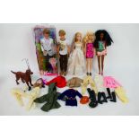 Mattel - Barbie - Ken - A boxed Ken doll with 4 x unboxed dolls and a collection of clothing and