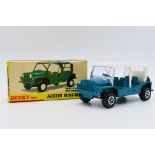 Dinky - A boxed late model Austin Mini-Moke in metallic green with Speedwheels # 342.