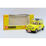 Corgi - A boxed Monte-Carlo Mini Cooper S with whizzwheels in yellow racing number 177 # 308.